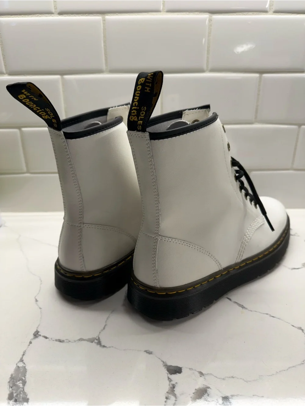 Dr. Martens White Leather Lace-Up Platform Boots with Black Sole